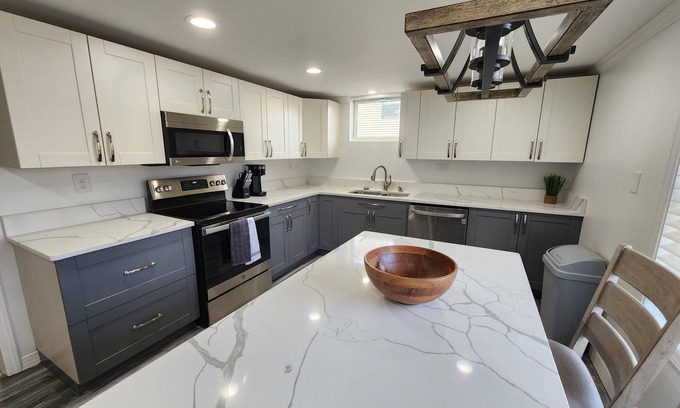 Marion House | Lake Front Family Retreat with Private Dock & Pool Amenities