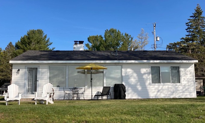 East Tawas Cottage | Experience Lake House Living with Spectacular Views!