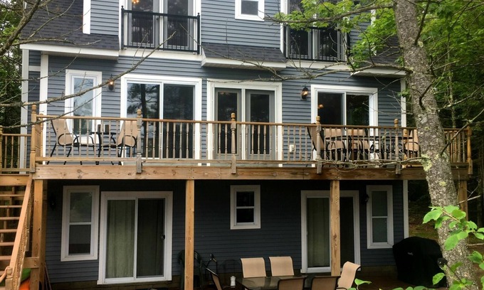 Manistique House | Lake House Oasis: Relax by the Pool with Ocean Views