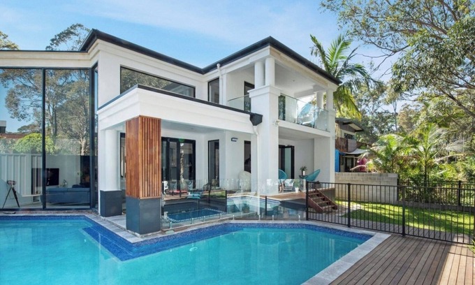 Kings Point House | Lake House Retreat with Pool, Theatre Room & Ocean Views