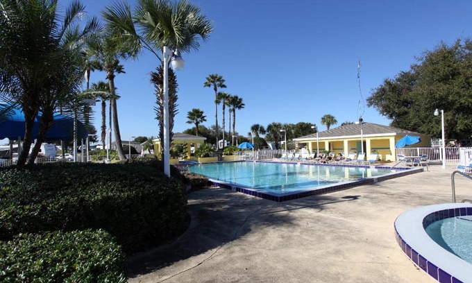 West Kissimmee Resort | Lake Magic Cottage 1: Pet-Friendly Oasis with Pool & Hot Tub