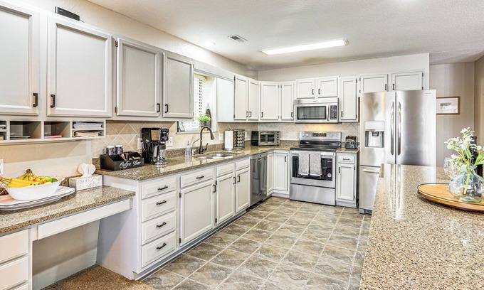 Gravois Mills Cottage | Relaxing Lakefront Home with Dock & Water Slide Access