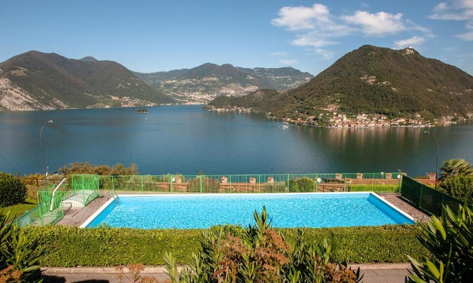 Sulzano Apartment | Lake View 34: Oceanfront Escape with Pool & High Ratings