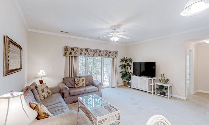Little River Condo | Lake-View Condo with Pool and Screened Patio Escape