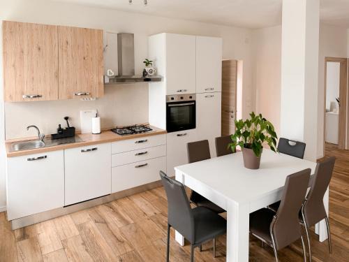 Levico Terme Apartment | Scenic Lake View Levico: Rated 10/10 & Pet Friendly