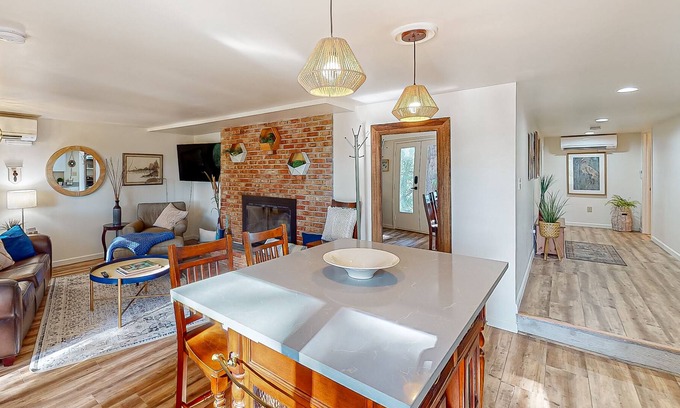 Maple Heights-Lake Desire Apartment | Idyllic Lake View Suite with Fireplace & Tree-Lined Patio