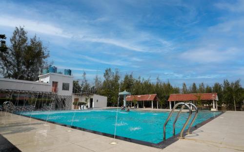 Tajpur Resort | Relax at Lake View Village Resort with Pool and Oceanfront