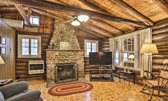 Rice Lake House | Lakefront 1930s Log Cabin with Private Beach & Dock Access