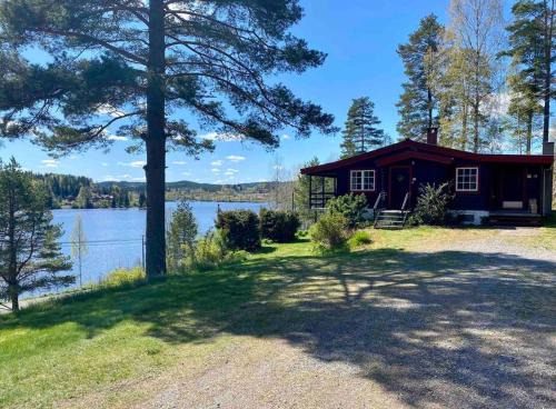 Eidskog House | Lakefront Cabin with Ocean Views and Pet-Friendly Amenities