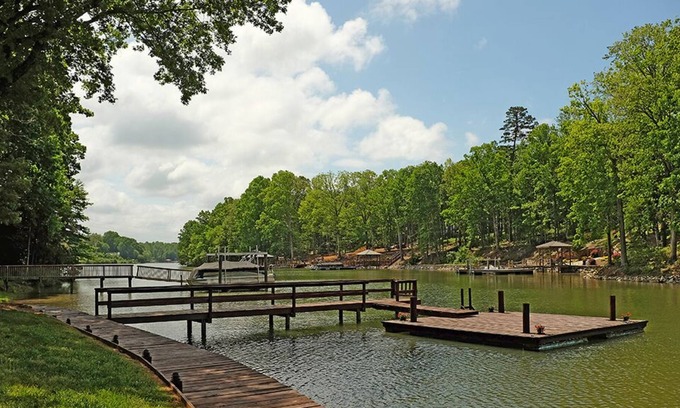 Troutman House | Lakefront Cottage located in a quiet cove with a fire-pit, kayaks & paddle board