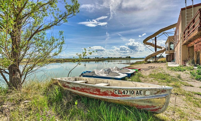 Wheatland House | Inviting Lakefront Country Home with Waterslide & Trampoline
