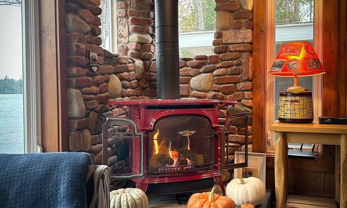 Gwinn Cottage | Cozy Cedar Cottage: Lakefront Retreat with Spa & Firepit