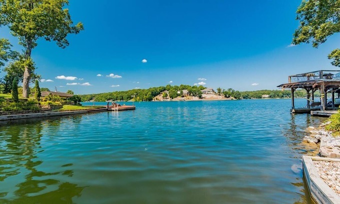 Bella Vista Villa | Lakefront Retreat with Private Dock & Pool, Rated 10/10