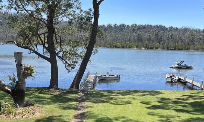 Lake Conjola House | Serene Lakefront Retreat with Private Jetty & Family Amenities