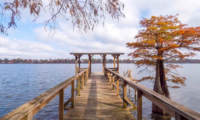 St. Joseph House | Picturesque Lakefront Netterville Landing with Private Dock