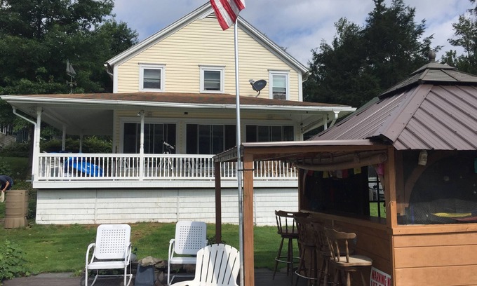 Nicholson House | Scenic Lakefront Retreat with Pool, Near Golf & Skiing