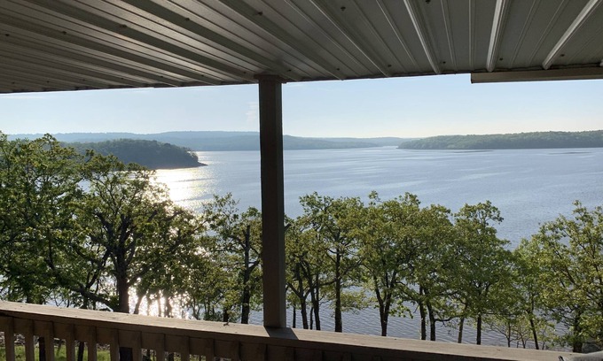 Canadian House | Lakefront Retreat: Breathtaking Views & Pet-Friendly Amenities