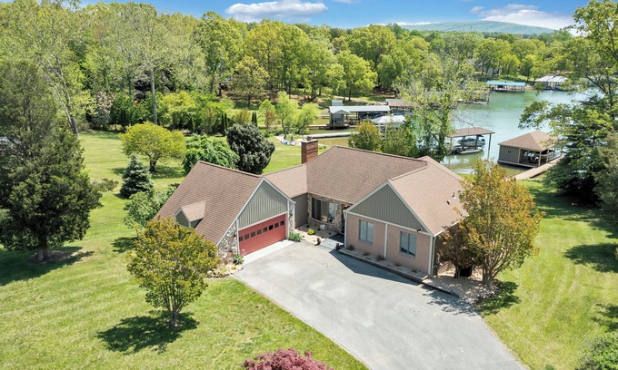 Huddleston House | Lakefront Escape: Private Dock and Pool, Rated 9.8!