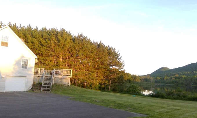 Presque Isle Apartment | Inviting Lakeside Getaway with Firepit and Gazebo