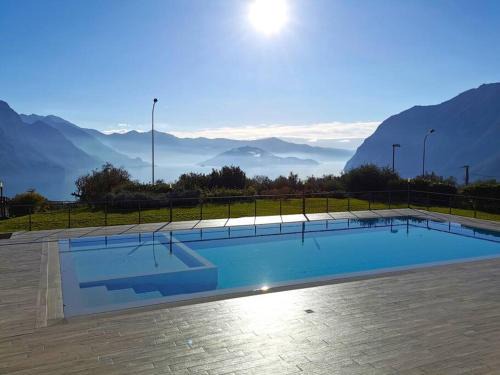 Zorzino Apartment | Inviting Lakeview Escape with Pool and Oceanfront Views