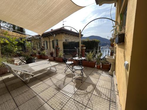 Como Apartment | Lakeview Loft with Terrace and Oceanfront Views - 10/10 Rated