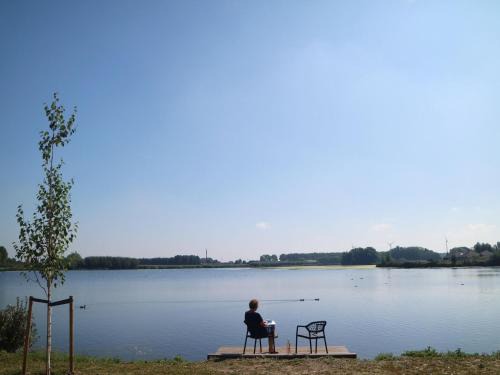 Municipality of Nissewaard House | Scenic Lakeview Villa with Swimming Pool & Fishing Pier