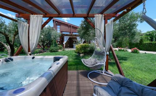 Thermi Villa | Discover Lakkia - Wooden Residence with Spa & Hot Tub