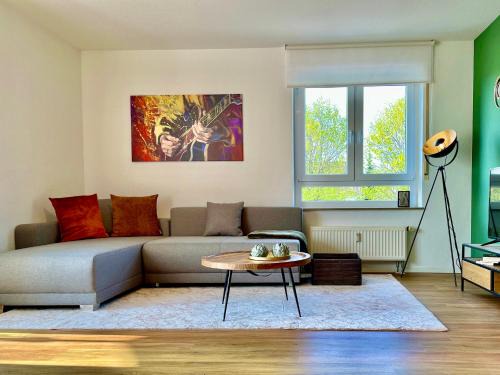 Renningen Apartment | Elegant Design Oase: Central Location with Kitchen & Pool