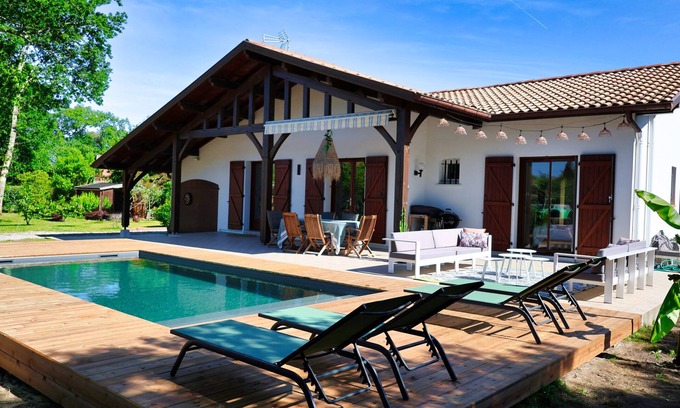 Tosse House | Unwind at Landes Villa in a Serene Wooded Park