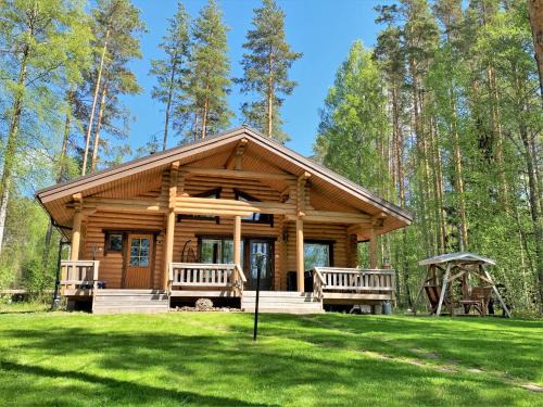 Puumala Ski Chalet | Experience Lappalaisen lomamökit Norpparanta's Private Beach