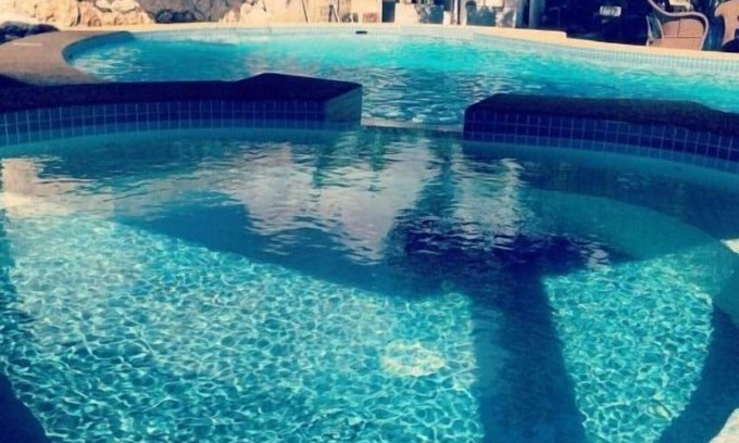 Basak House | Relax at Lapu Lapu Cottages with Pool & Spa Amenities