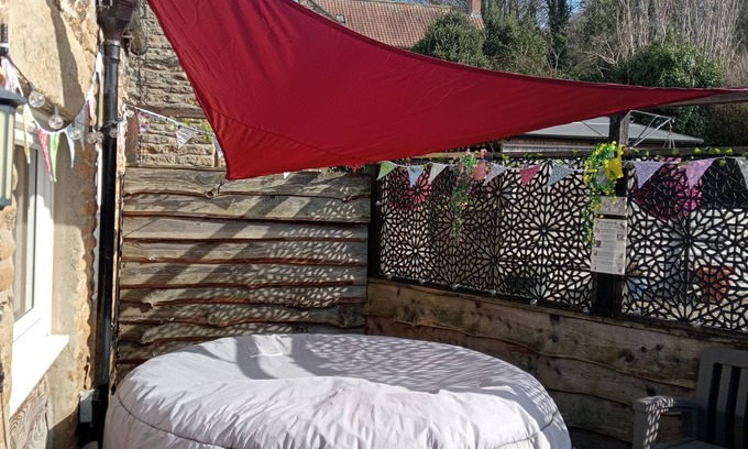 Wykeham Cottage | Pet-Friendly Larch Cottage with Hot Tub in Rustic Village