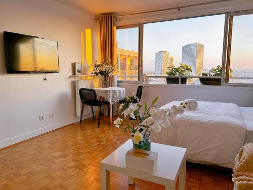 Python Duvernois Apartment | Large charming studio in Paris
