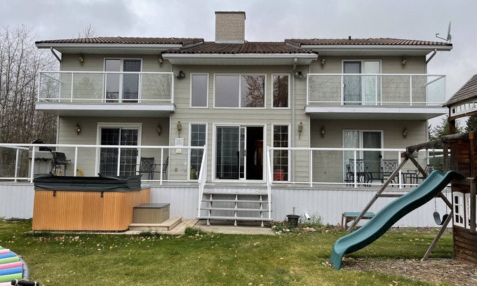 Sherwood Park House | Spacious Lakefront Retreat for Families with Boats & Dock