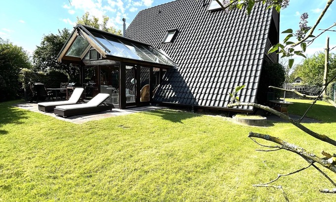 Rustersiel House | Idyllic Holiday Home with Ocean View, Garden & Terrace