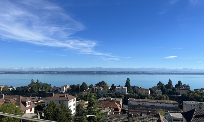 Neuchatel Apartment | Inviting Penthouse Apartment Overlooking the Lake