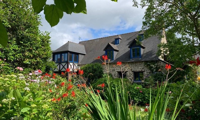 Roz-Landrieux House | Inviting Stone House Surrounded by Lush Greenery