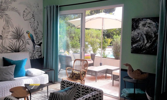 Le Brulat Apartment | Elegant Studio with Pool Views and Garden Spa Oasis