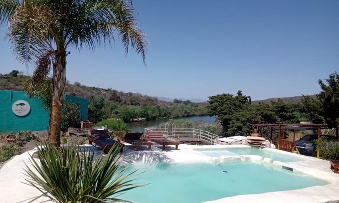 La Falda Cabin | Discover Las Acacias Refugio: Oceanfront Getaway Awaits