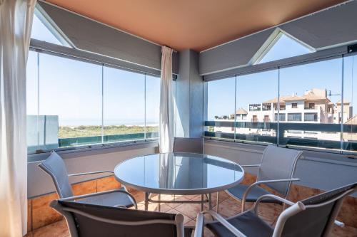 Punta del Moral Apartment | Relax at Las Palmeras by Ĥ: Poolside Family Retreat