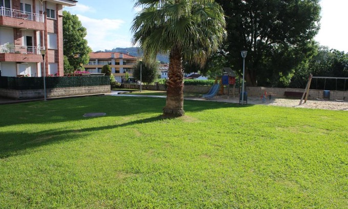 San Miguel de Meruelo Apartment | Family-Friendly Retreat at Las Palmeras with Pool Access