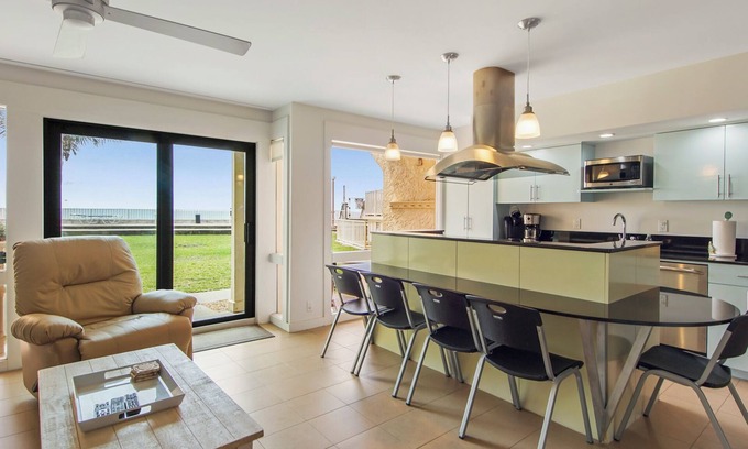 Fort Bay Condo | Latitude 29: Oceanfront Retreat with Breakfast Included