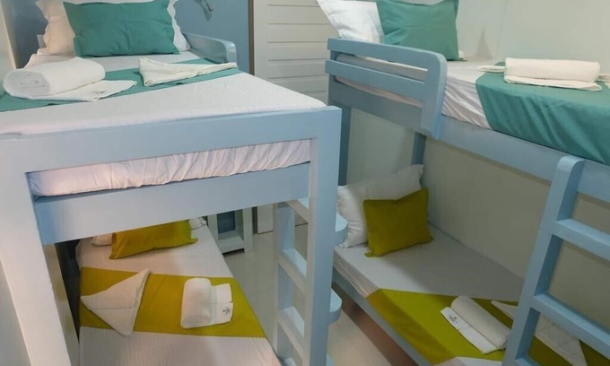 El Nido House | Family-Friendly Quad Deluxe Room at Laule a Hostel El Nido