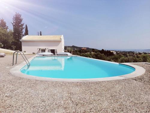 Lygia Apartment | Relax at Laura Sea View Apartment with Pool and Oceanfront