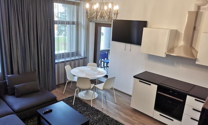 Ukmerge Apartment | Discover Laurentroom Center: Pet-Friendly with Family Amenities