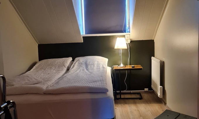 Vestmannaeyjar House | Inviting Lava Guesthouse: Family-Friendly with Delicious Dining