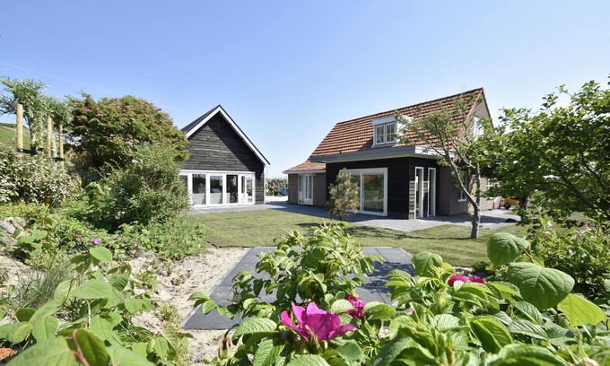 Julianadorp aan zee Villa | Exquisite Villa with Ocean View & Private Pool in Julianadorp