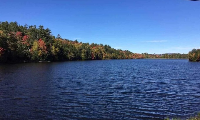 Bath House | Experience Cozy Retreat at Lazy Moose Log Cabin with Hot Tub