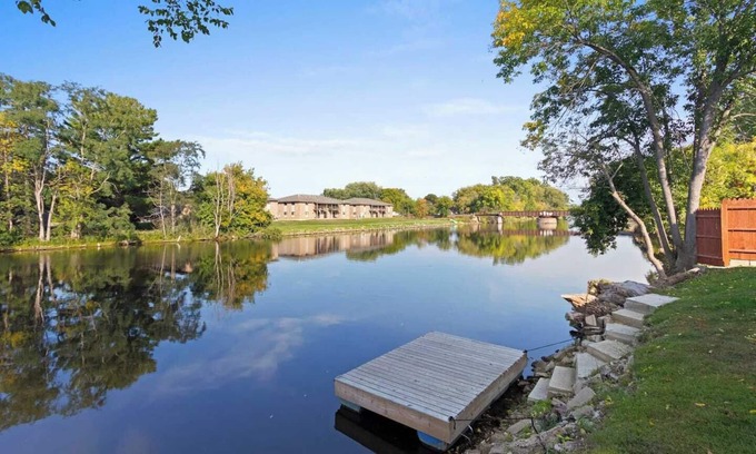 Oconto House | Relax at Lazy River Villa with Hot Tub & Fenced Yard