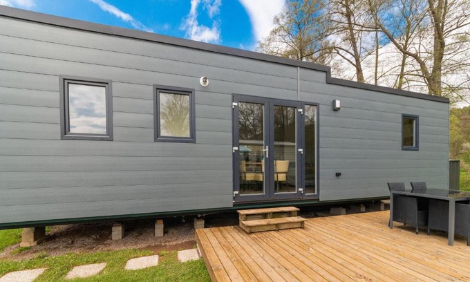 Erezee House | Cozy Mobile Home with Terrace by the Brook, Pet Friendly
